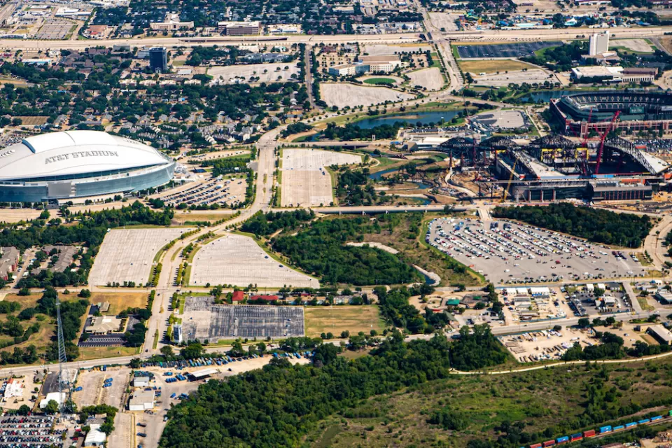 Aerial view of two sports stadiums in Arlington, Texas.